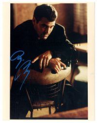 1r0957 GEORGE CLOONEY signed color 8x10.25 REPRO still '00s cool close up of actor seated with gun
