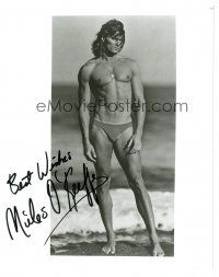 1r1137 MILES O'KEEFFE signed 8x10 REPRO still '80s barechested on beach wearing swimsuit!