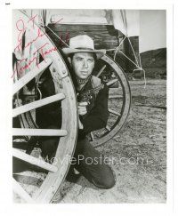 1r1287 TOMMY FARRELL signed 8x10 REPRO still '80s great cowboy portrait taking cover by wagon wheel!