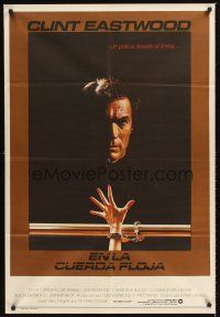 1s232 TIGHTROPE Argentinean '84 Clint Eastwood is a cop on the edge, cool handcuff image!