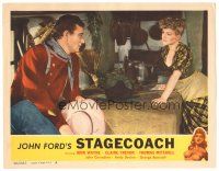 2k054 STAGECOACH LC #8 R48 great close up of John Wayne staring across hearth at Claire Trevor!