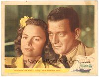 2k059 THEY WERE EXPENDABLE LC #7 '45 super close up of John Wayne in uniform & pretty Donna Reed!