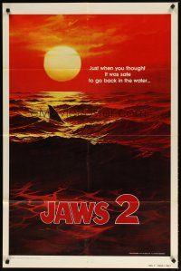 3b437 JAWS 2 undated teaser 1sh '78 classic art of man-eating shark's fin in red water at sunset!