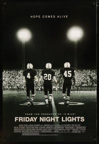 3f273 FRIDAY NIGHT LIGHTS DS 1sh '04 Texas high school football, image of players on field!