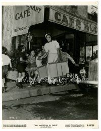 3k027 AMERICAN IN PARIS 7.75x10 still R63 great image of Gene Kelly outside cafe with kids!
