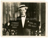 3k594 MAURICE CHEVALIER 8x10.25 still '30 holding French & English intertitles from The Big Pond!