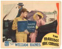 3y660 MARINES ARE COMING LC '34 William Haines shows the Date Book to pretty Armida in buggy!