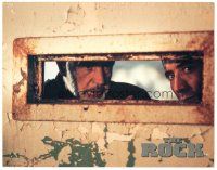 3y803 ROCK LC '96 close up of Sean Connery & Nicolas Cage peering through slot in door!