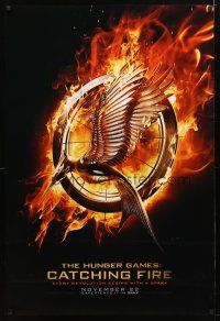 4s006 HUNGER GAMES: CATCHING FIRE teaser DS 1sh '13 every revolution begins with a spark!