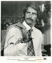 4t483 SAM ELLIOTT signed 8.25x10 still '75 c/u with suit jacket over his shoulder from Lifeguard!