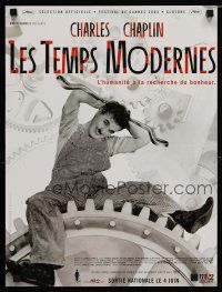 5e518 MODERN TIMES French 15x21 R02 great image of Charlie Chaplin seated on gear!