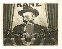 5k262 CITIZEN KANE 8x10.25 still '41 classic image of Orson Welles at rally with giant poster!