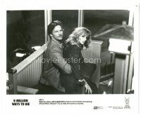 6c052 8 MILLION WAYS TO DIE 8.25x10.25 still '86 Jeff Bridges forces Rosanna Arquette to help him!