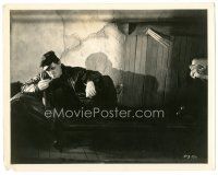 6c287 DOCKS OF NEW YORK 8x10 still '28 c/u of George Bancroft on couch lighting a cigarette!