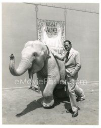 6c291 DOCTOR DOLITTLE 7.25x9.25 still '67 Rex Harrison posing by young elephant!