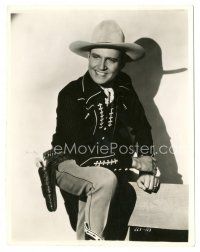 6c358 GENE AUTRY 7.75x10 still '40 great close portrait with one foot up in cowboy outfit!