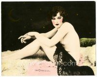 6c021 LADY OF THE NIGHT color deluxe 7x9 still '28 topless lady sitting on fur partially covered!