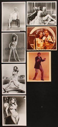 6f114 LOT OF 7 REPRO 8X10 STILLS '80s Marilyn Monroe, Raquel Welch, Roger Moore as James Bond!