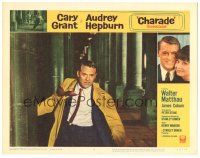 6h242 CHARADE LC #2 '63 great close up of Cary Grant running between stone pillars!
