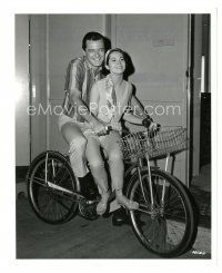 6t632 HONEYMOON HOTEL candid 8.25x10 still '64 Robert Goulet & Nancy Kwan ride bike together!