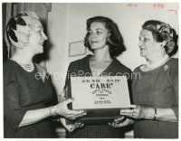 6t711 LAUREN BACALL 7.75x10 publicity still '59 at CARE Day in New York delivering CARE package!
