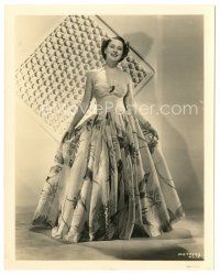 6t155 NORMA SHEARER 8x10.25 still '30s smiling portrait in low-cut gown with colorful skirt!