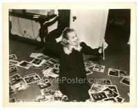 6t793 NOTHING SACRED 8x10.25 still '37 Carole Lombard gets frustrated looking through photos!
