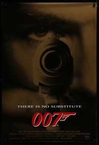 7d382 GOLDENEYE 1sh '95 super close up of Pierce Brosnan as secret agent James Bond with gun!