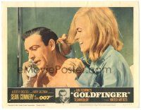 7d066 GOLDFINGER LC #2 '64 c/u of sexy Shirley Eaton behind Sean Connery as James Bond on phone!