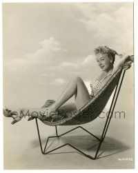 7s106 BONITA GRANVILLE 7.25x9.25 still '56 sexy seated portrait in bathing suit, showing her legs!