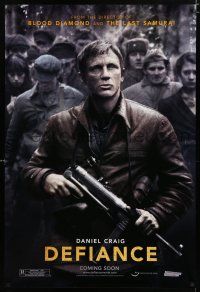 8c218 DEFIANCE teaser DS 1sh '08 Edward Zwick directed, rugged Daniel Craig w/machine gun!