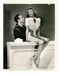 8h433 IN THE NAVY 8x10 key book still '41 c/u of sailor Dick Powell staring at pretty Claire Dodd!