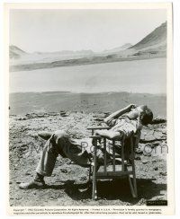 8h556 LAWRENCE OF ARABIA candid 8x10.25 still '63 c/u of Peter O'Toole relaxing on the desert set!