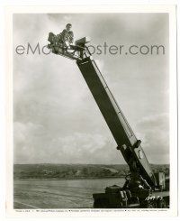 8h863 TARNISHED ANGELS candid 8.25x10 still '58 Rock Hudson way up in the air on crane looking sad!