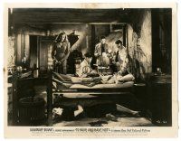 8h899 TO HAVE & HAVE NOT 8x10.25 still '44 Lauren Bacall watches Humphrey Bogart with wounded man!
