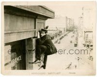 9a762 SAFETY LAST 8x10.25 still '23 Harold Lloyd hanging over busy street w/pigeon on his head!