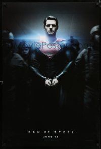 9b447 MAN OF STEEL teaser DS 1sh '13 Henry Cavill in the title role as Superman handcuffed!