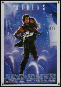 9e991 ALIENS REPRODUCTION 1sh '86 James Cameron, Signourney Weaver as Ripley, this time it's war!