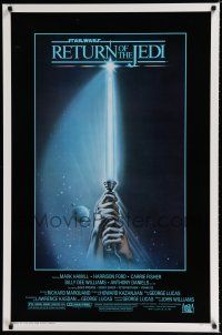 9h067 RETURN OF THE JEDI 1sh '83 George Lucas classic, great artwork of hands holding lightsaber!