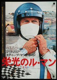 9j324 LE MANS Japanese '71 best c/u of race car driver Steve McQueen adjusting helmet!