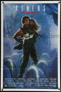 9z036 ALIENS 1sh '86 James Cameron, Sigourney Weaver as Ripley holding Carrie Henn!