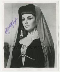 1a726 ELIZABETH TAYLOR signed 8.25x10 REPRO still '80s in a sexy revealing costume as Cleopatra!