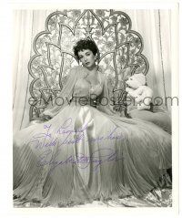 1a440 ELIZABETH TAYLOR signed 8.25x10 still '50s beautiful seated portrait in flowing gown!