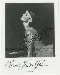 1a351 OLIVIA NEWTON-JOHN signed 8x10 music publicity still '80s sexy profile portrait in the ocean!