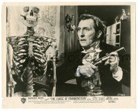 1a566 PETER CUSHING signed 8x10.25 still '57 c/u with gun & skeleton in Curse of Frankenstein!