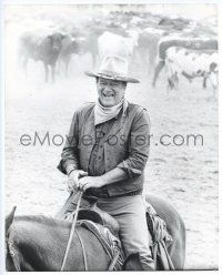 1b054 COWBOYS 11.25x14 still '72 close up of happy John Wayne on horseback during cattle drive!