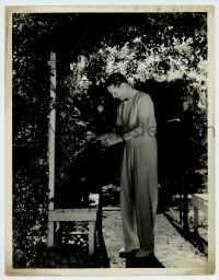 1b093 FRANCHOT TONE deluxe 10x13 still '30s at home trimming plants in his garden by Russell Ball!