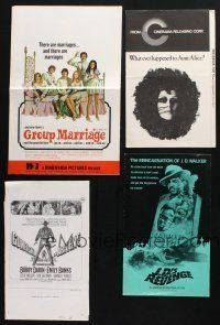 1h096 LOT OF 31 CUT PRESSBOOKS '50s-70s great advertising images from a variety of movies!