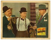 1r506 BULLFIGHTERS LC '45 Oliver Hardy removes Stan Laurel's coat as Ralph Sanford threatens them!