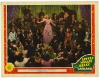 1r704 LITTLE NELLIE KELLY LC '40 crowd watches Judy Garland performing on stage with band!